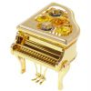Zebra Music golden mini piano with Swarovski crystals Zebra Music golden mini piano with Swarovski crystals